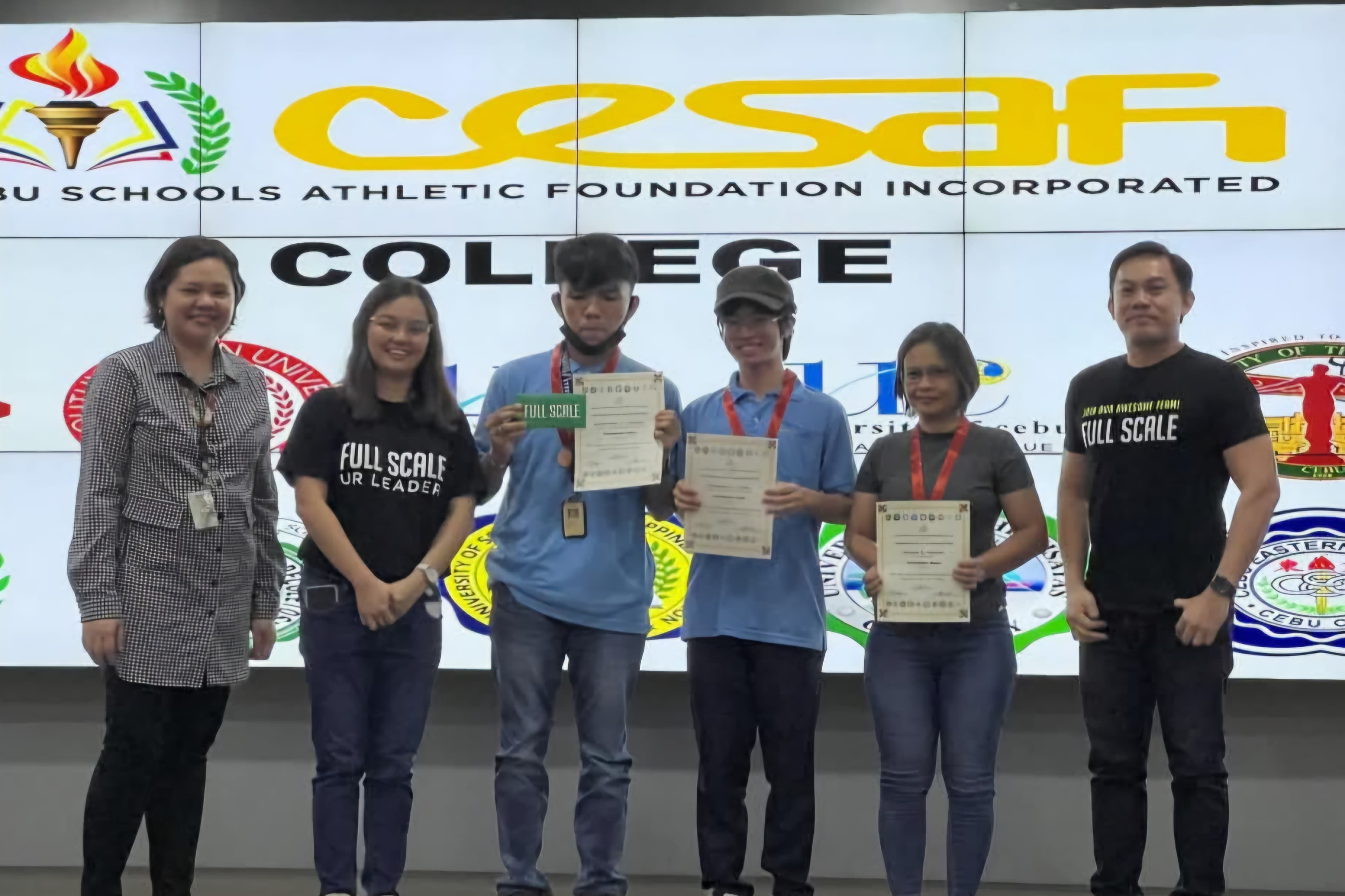 CESAFI Computer Quiz awardees holding certificates with faculty members