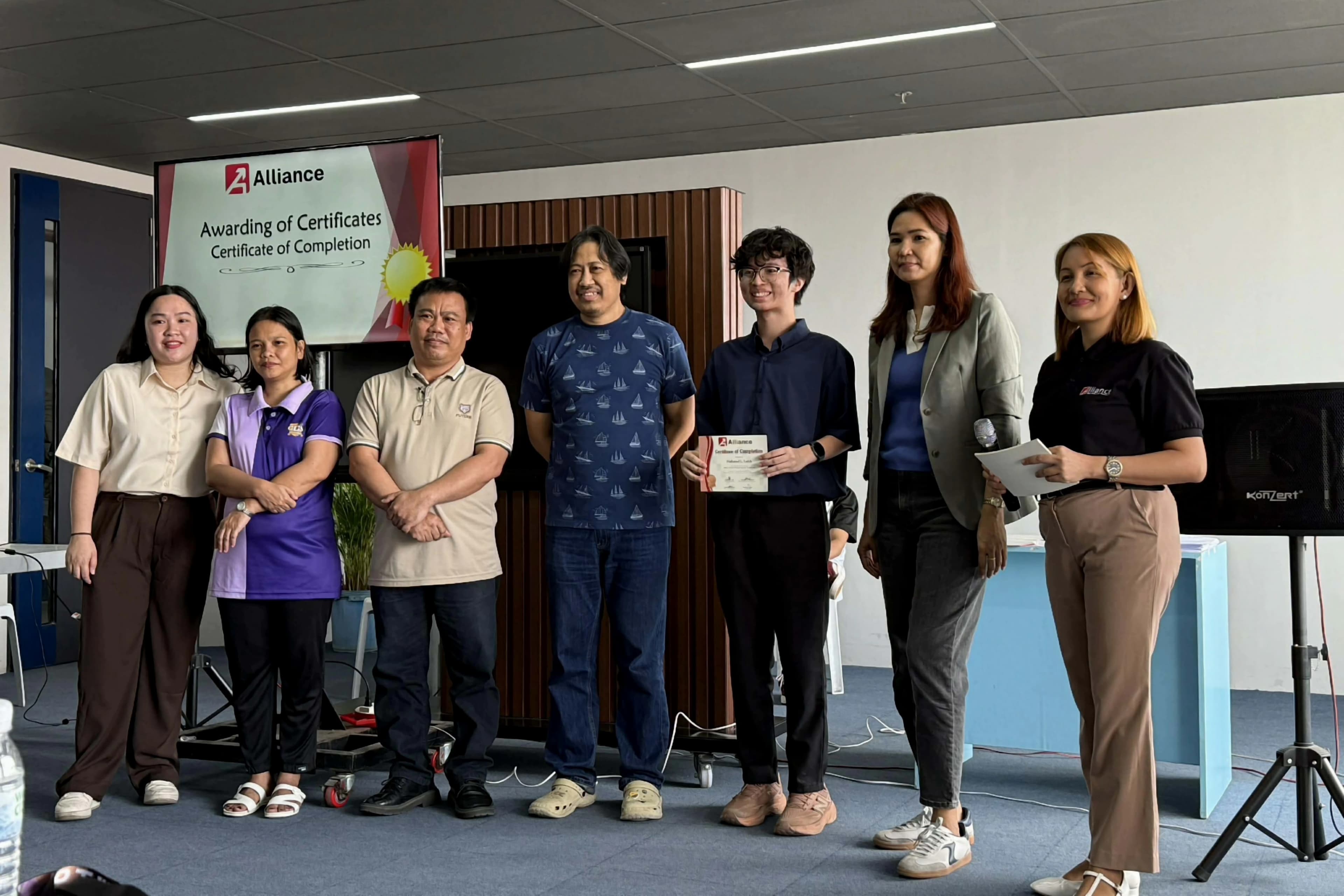 Alliance Jumpstart trainees receiving certificates of completion